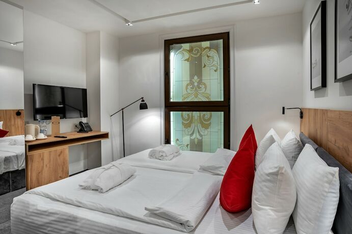 Imagen de la habitación del Hotel La Maison Residence. Foto 15