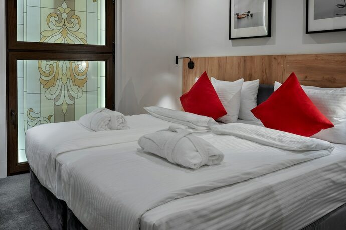 Imagen de la habitación del Hotel La Maison Residence. Foto 17