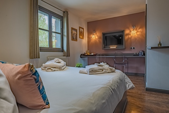 Imagen de la habitación del Hotel La Maison Rouge. Foto 4