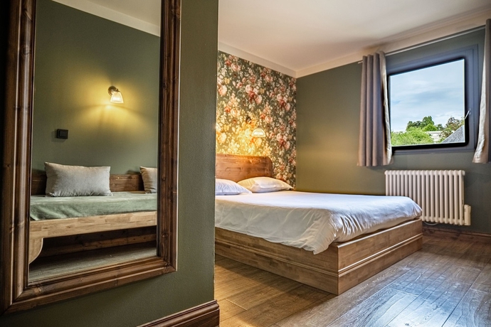 Imagen de la habitación del Hotel La Maison Rouge. Foto 7