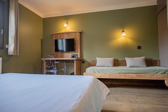 Imagen de la habitación del Hotel La Maison Rouge. Foto 8