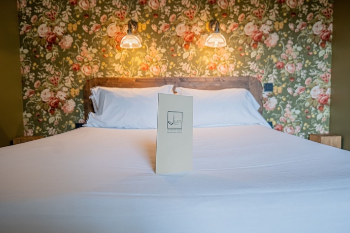 Imagen de la habitación del Hotel La Maison Rouge. Foto 13