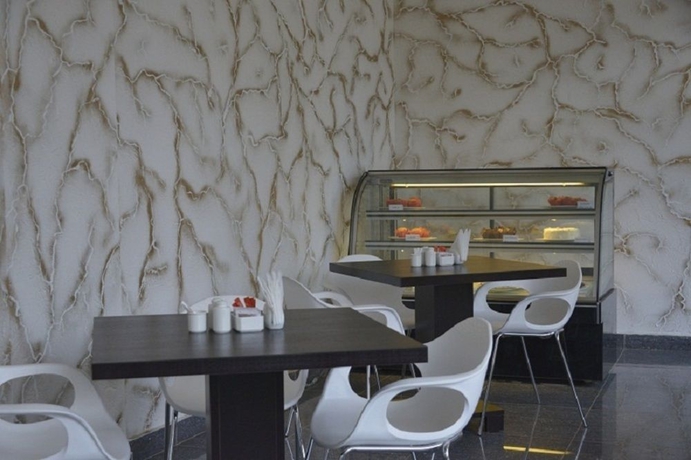 Imagen del bar/restaurante del Hotel La Maison Royale, NAIROBI. Foto 7