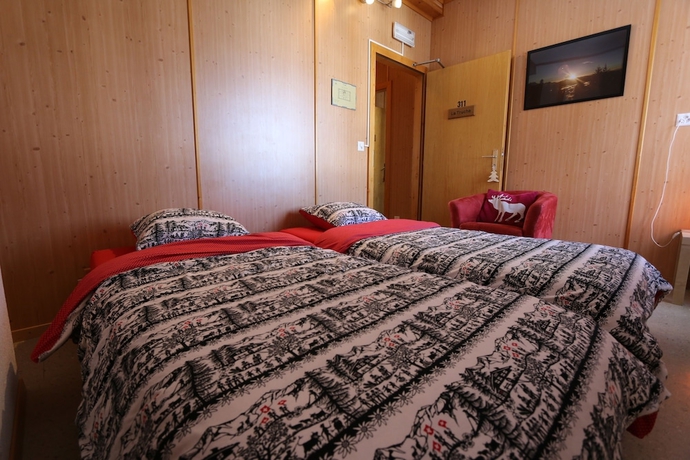 Imagen de la habitación del Hotel La Maison de la Montagne. Foto 13
