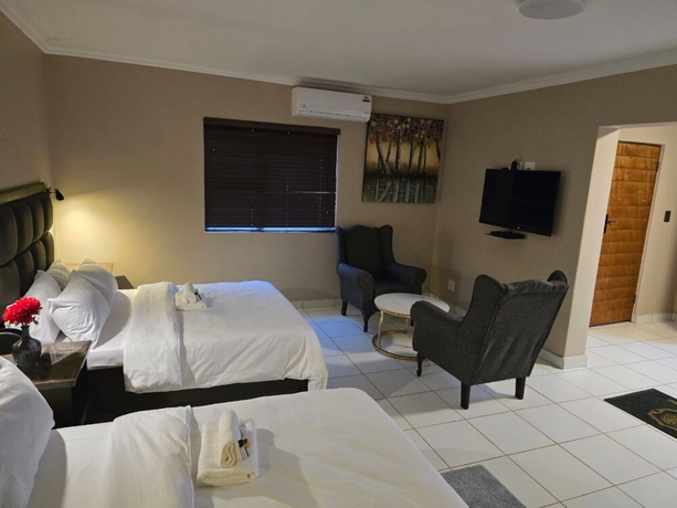 Imagen de la habitación del Hotel La Majestic Guest Lodge. Foto 7