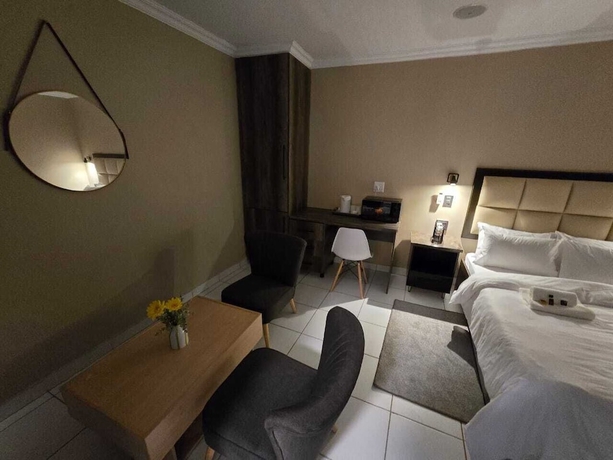 Imagen de la habitación del Hotel La Majestic Guest Lodge. Foto 10