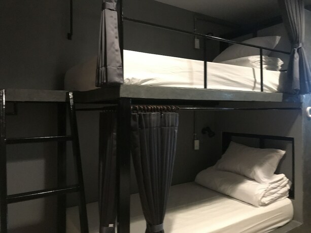 Imagen de la habitación del Hotel La Malila Hostel. Foto 14