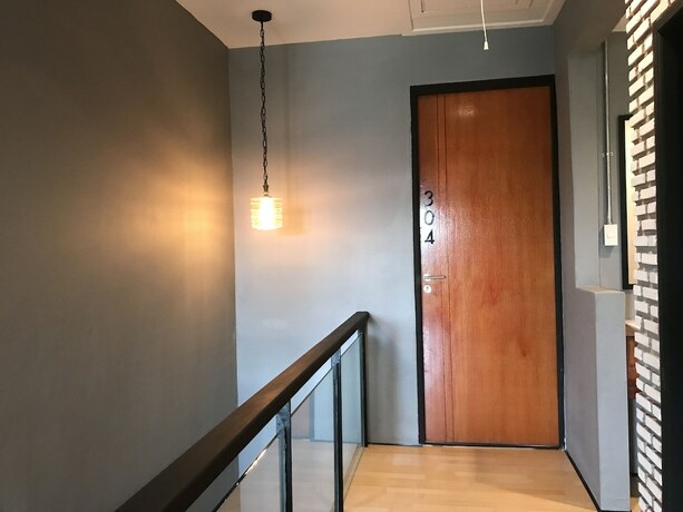 Imagen de la habitación del Hotel La Malila Hostel. Foto 18