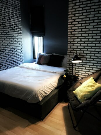 Imagen de la habitación del Hotel La Malila Hostel. Foto 19