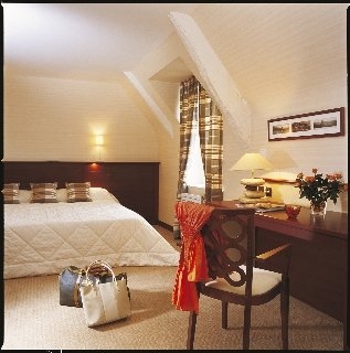 Imagen de la habitación del Hotel La Malouiniere Des Longchamps. Foto 14
