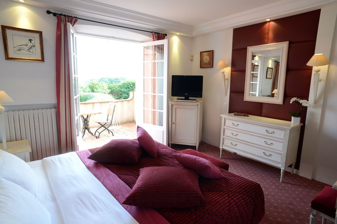 Imagen de la habitación del Hotel La Mandarine. Foto 9