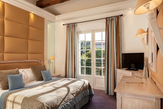 Imagen de la habitación del Hotel La Mandarine. Foto 10