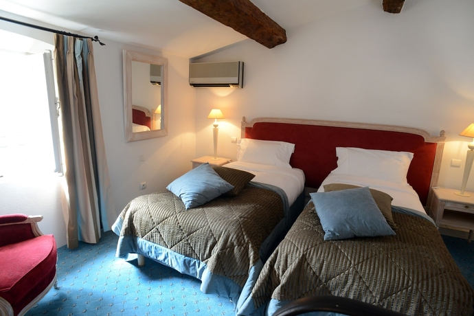 Imagen de la habitación del Hotel La Mandarine. Foto 12