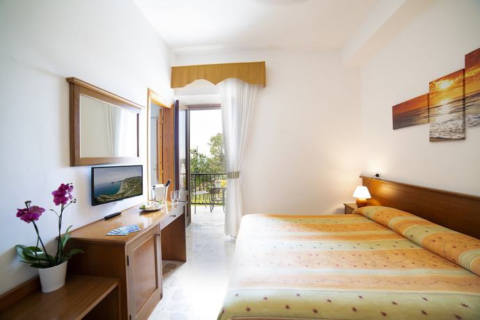 Imagen de la habitación del Hotel La Mandorla. Foto 12