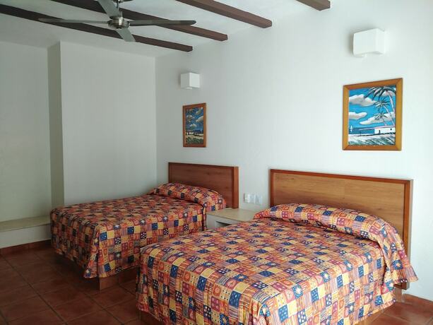 Imagen de la habitación del Hotel La Mansi&oacute;n del Faro. Foto 17