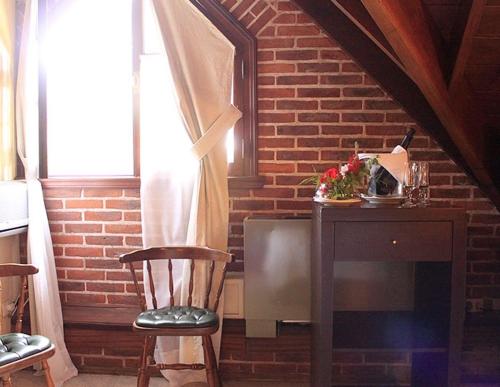 Imagen de la habitación del Hotel La Mansion Del Bosque. Foto 7