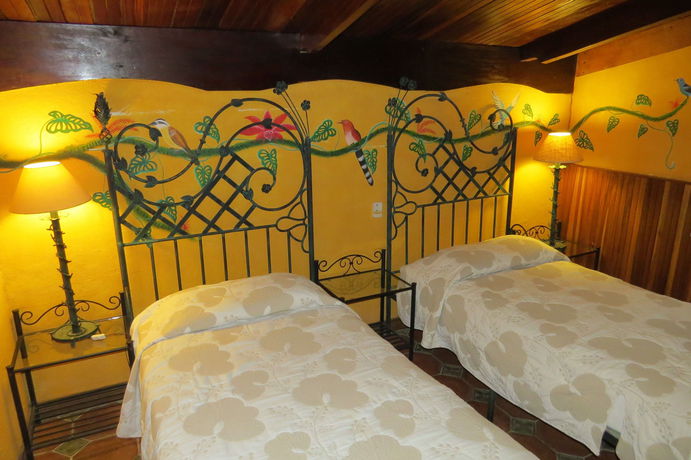 Imagen de la habitación del Hotel La Mansion Inn Arenal. Foto 12