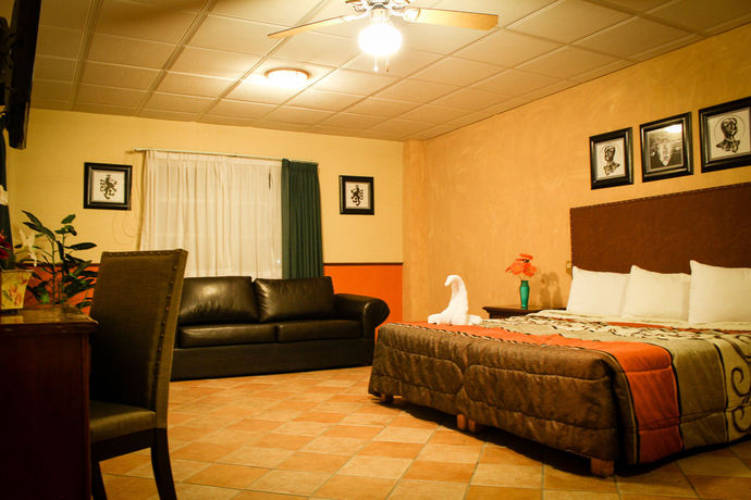 Imagen de la habitación del Hotel La Mansion Suiza. Foto 5