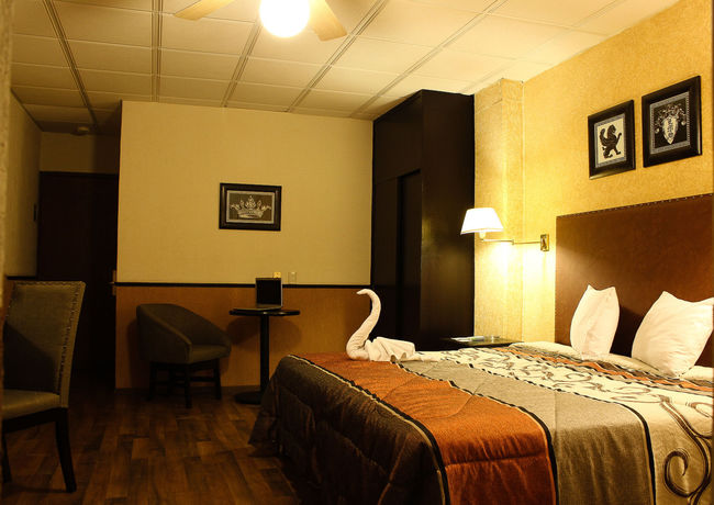 Imagen de la habitación del Hotel La Mansion Suiza. Foto 7