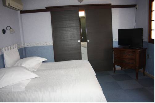 Imagen de la habitación del Hotel La Marjolaine, Antibes. Foto 5