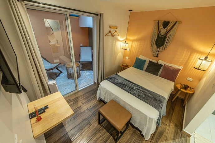 Imagen de la habitación del Hotel La Martina Boutique. Foto 20