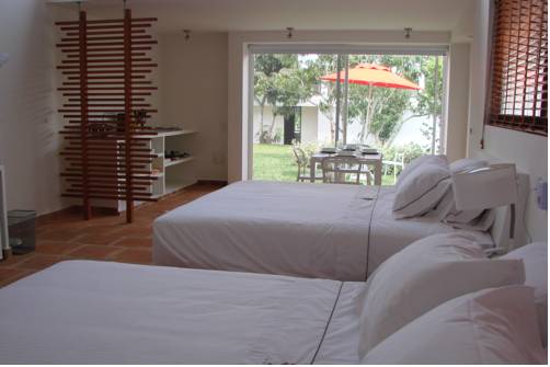 Imagen de la habitación del Hotel La Masia Boutique. Foto 3