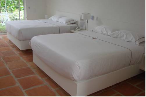 Imagen de la habitación del Hotel La Masia Boutique. Foto 5