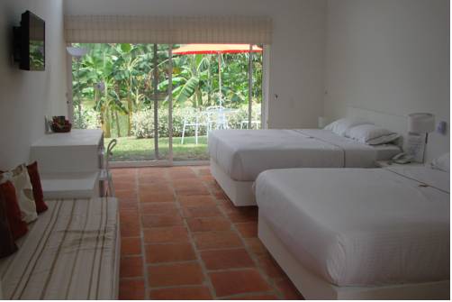 Imagen de la habitación del Hotel La Masia Boutique. Foto 6