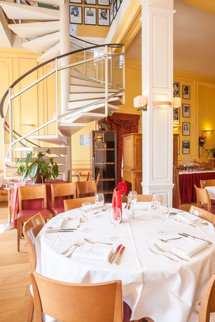 Imagen del bar/restaurante del Hotel La Mère Poulard. Foto 5