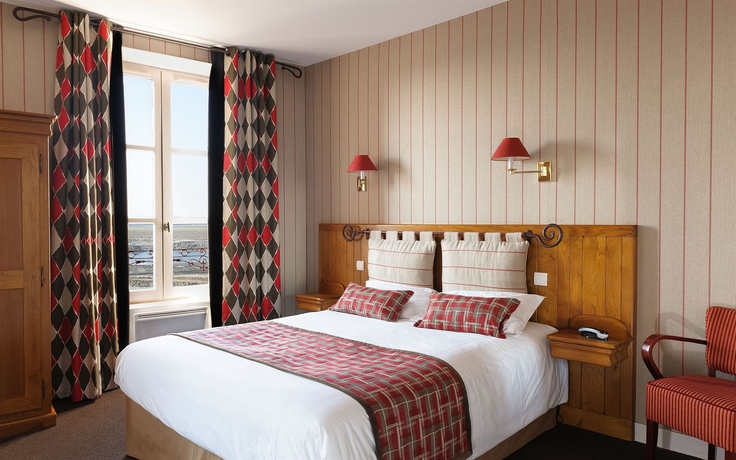 Imagen de la habitación del Hotel La Mère Poulard. Foto 9