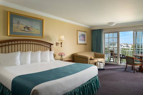 Imagen de la habitación del Hotel La Mer Beachfront Resort. Foto 13