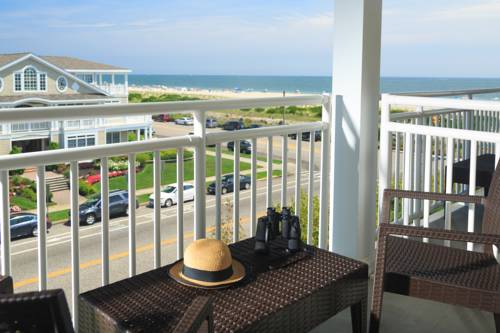 Imagen de la habitación del Hotel La Mer Beachfront Resort. Foto 14