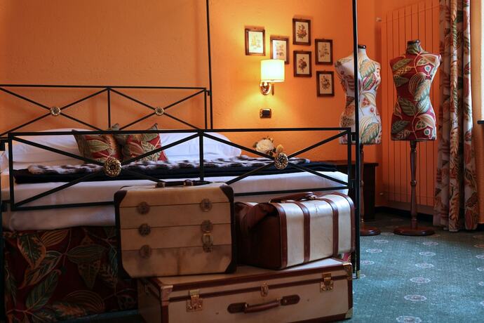 Imagen de la habitación del Hotel La Meridiana Relais and Chateaux. Foto 11