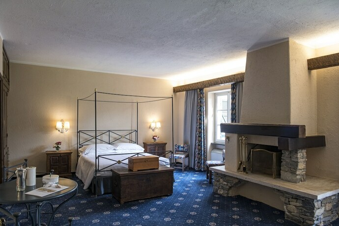 Imagen de la habitación del Hotel La Meridiana Relais and Chateaux. Foto 15