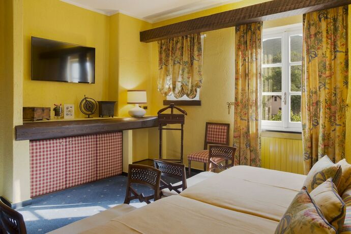 Imagen de la habitación del Hotel La Meridiana Relais and Chateaux. Foto 16