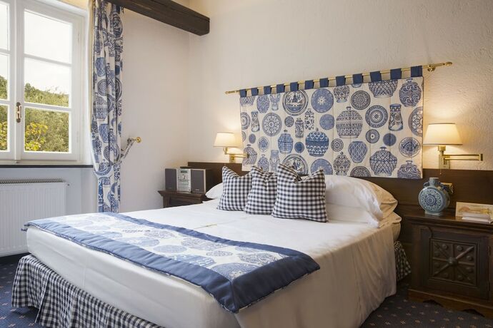 Imagen de la habitación del Hotel La Meridiana Relais and Chateaux. Foto 19