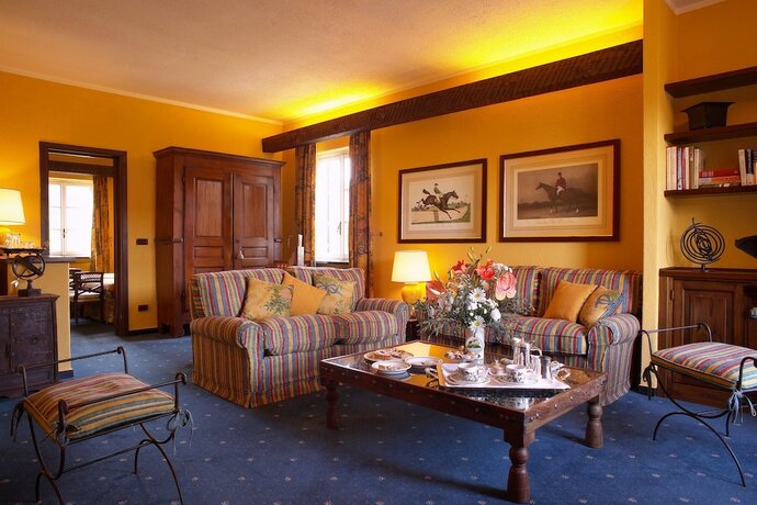 Imagen de la habitación del Hotel La Meridiana Relais and Chateaux. Foto 20