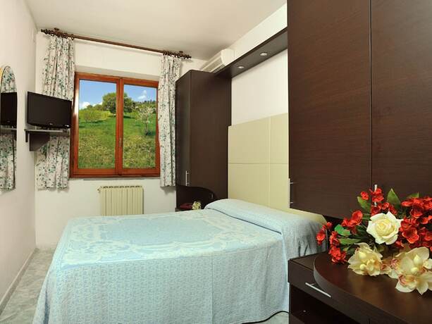 Imagen de la habitación del Hotel La Meridiana, Urbino. Foto 18