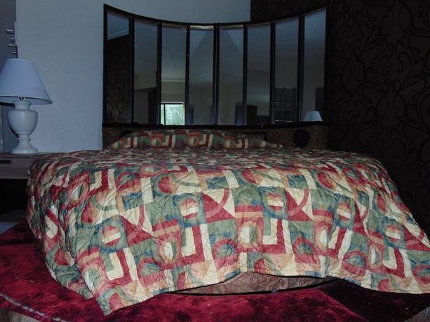 Imagen de la habitación del Hotel La Mirage Motor Inn. Foto 8