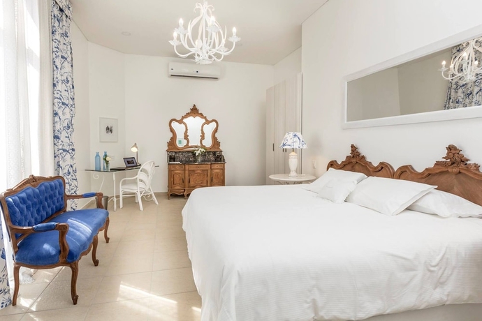 Imagen de la habitación del Hotel La Mision Boutique. Foto 16