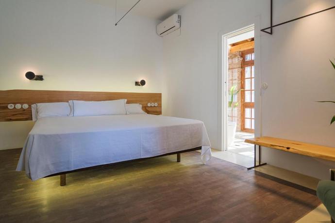 Imagen de la habitación del Hotel La Moderna Suites. Foto 5