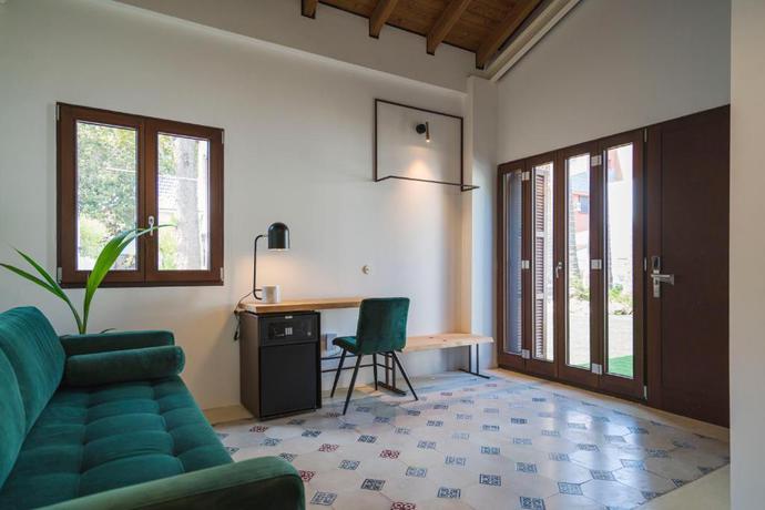 Imagen de la habitación del Hotel La Moderna Suites. Foto 9