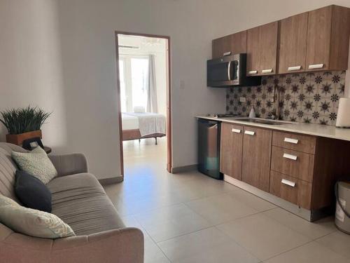 Imagen de la habitación del Hotel La Mona Loiza Apartments Complex. Foto 6