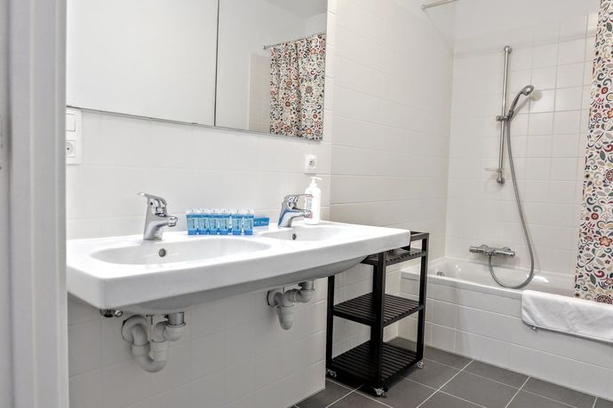 Imagen de la habitación del Hotel La Monnaie Residence. Foto 8