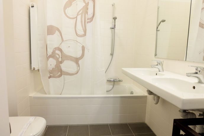 Imagen de la habitación del Hotel La Monnaie Residence. Foto 10