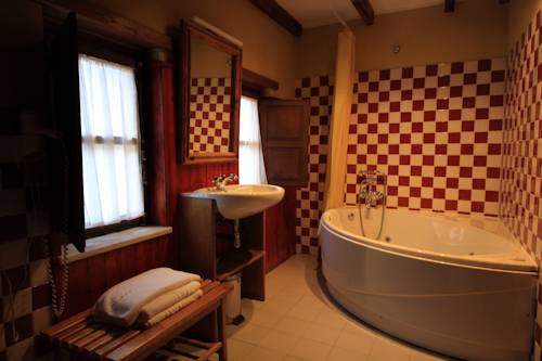 Imagen de la habitación del Hotel La Montaña Mágica Rural. Foto 3