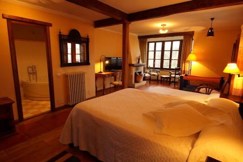 Imagen de la habitación del Hotel La Montaña Mágica Rural. Foto 5