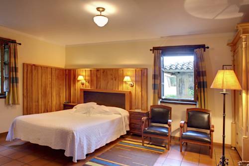 Imagen de la habitación del Hotel La Montaña Mágica Rural. Foto 9