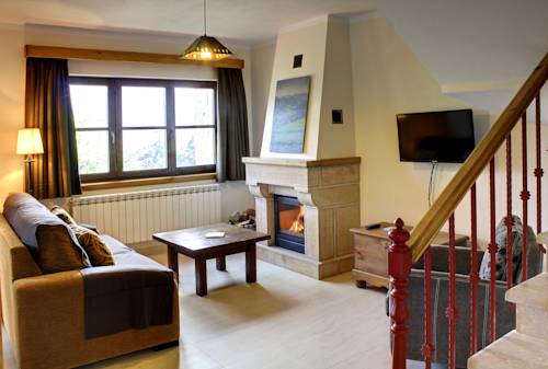 Imagen de la habitación del Hotel La Montaña Mágica Rural. Foto 10