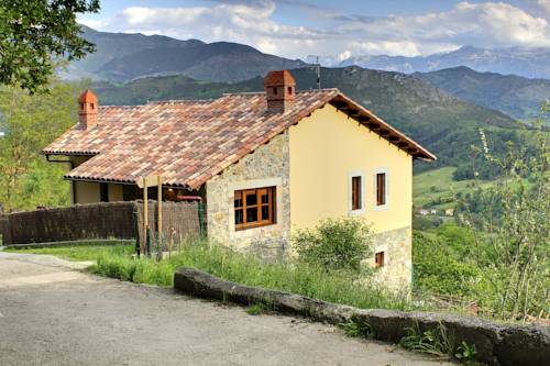 Imagen de la habitación del Hotel La Montaña Mágica Rural. Foto 11